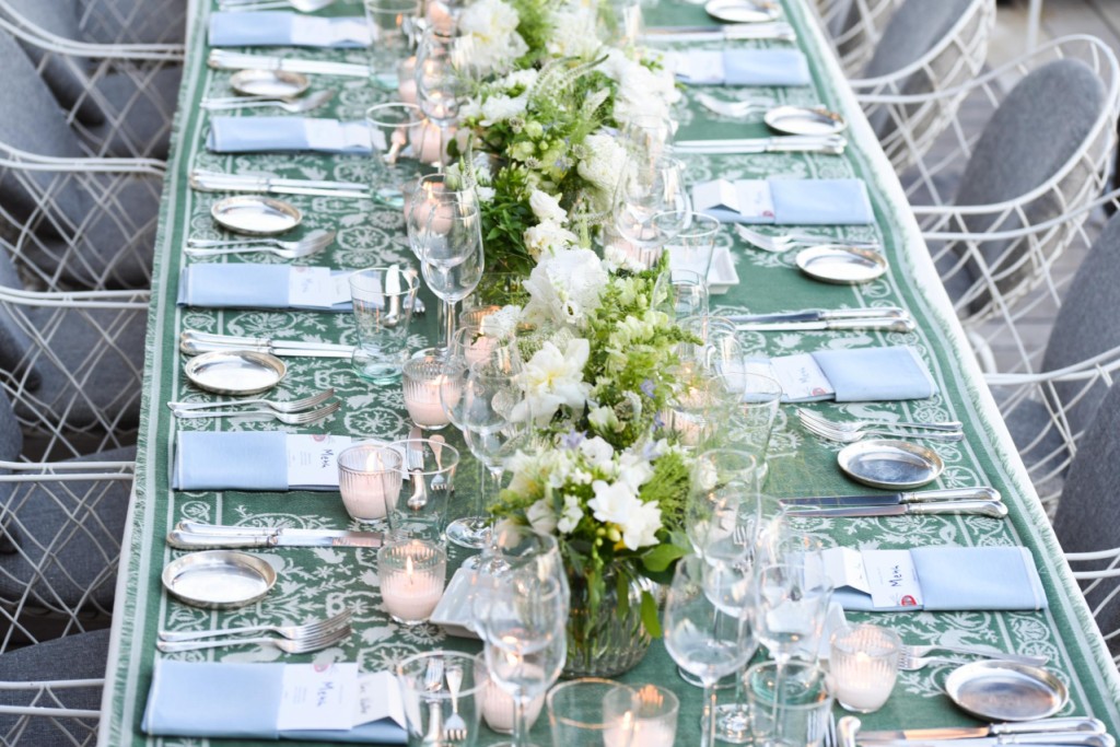 Light blue linen napkin with white stitching - Image 2