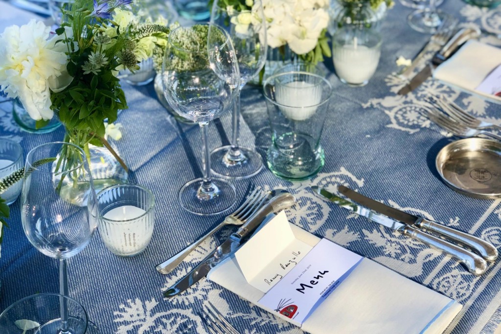 Off white linen napkin with light blue stitching - Image 1